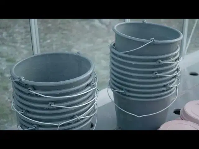 Video thumbnail for Gardening buckets in greenhouse