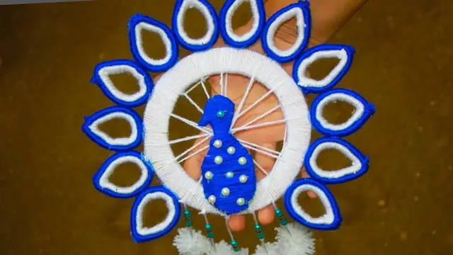 Video thumbnail for Wool peacock design | Woolen Making Idea - Woolen art and craft ideas