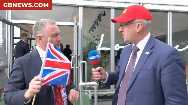'Video thumbnail for WATCH: Christopher Hope hands out the Union Flag to MPs and delegates at the Labour Party Conference'