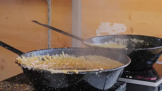 Video thumbnail for A Magical Holiday Showstopper: How to Make a Candlelit Gingerbread House Cake