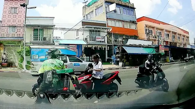 Video thumbnail for Scooter Student Collides with Delivery Rider at Bangkok Intersection