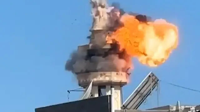 'Video thumbnail for Israeli ‘suicide drone’ attacks Gaza mosque and blows up minaret'