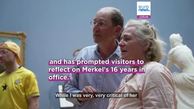 Video thumbnail for Hundreds of nostalgic Germans flock to see Angela Merkel’s portrait