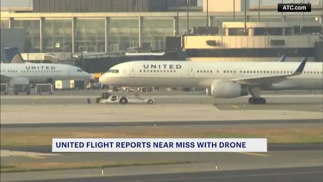 Video thumbnail for United Airlines plane spots drone during landing