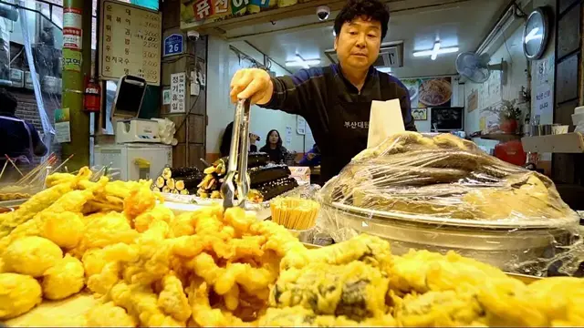 'Video thumbnail for KOREAN STREET FOOD at Mangwon Market | BEST KOREAN FOOD Market In Seoul? SPICY Street Food in Korea'