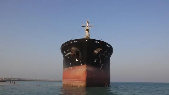 Video thumbnail for Iran: Thai-flagged ship damaged near Strait of Hormuz awaits removal off Iran's Qeshm Island.