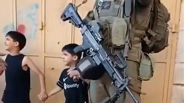 'Video thumbnail for Israeli soldiers detain Palestinian children for 'spying' in West Bank'