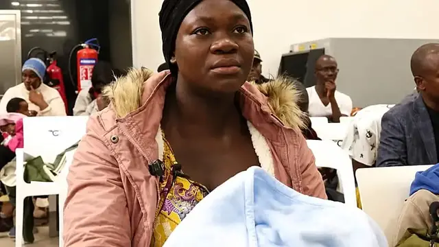 Video thumbnail for First batch of 273 Ugandans arrives from South Africa amid unrest