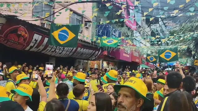 Video thumbnail for Brazil: Brazilian fans in Rocinha react as Norway knocks Brazil out of World Cup.
