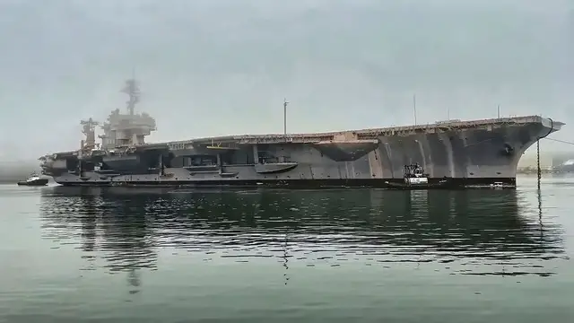 'Video thumbnail for USS Kitty Hawk Gets Tugged To The Graveyard'