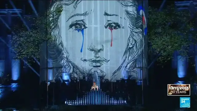 Video thumbnail for The 'Tree of Justice' lights up at commemoration of the 2015 Paris terror attacks