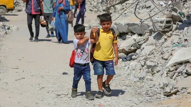 'Video thumbnail for Gaza’s school year begins in tents as Israeli bombardment destroys 90% of schools'