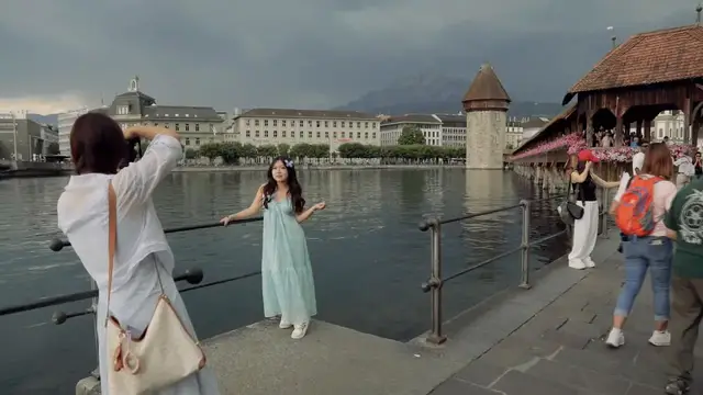 Video thumbnail for Switzerland: Chapel bridge in Swiss City of Lucerne remains one of top tourist attractions.