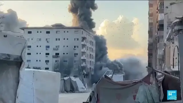 'Video thumbnail for Israel hits another residential tower as troops push Gaza offensive'