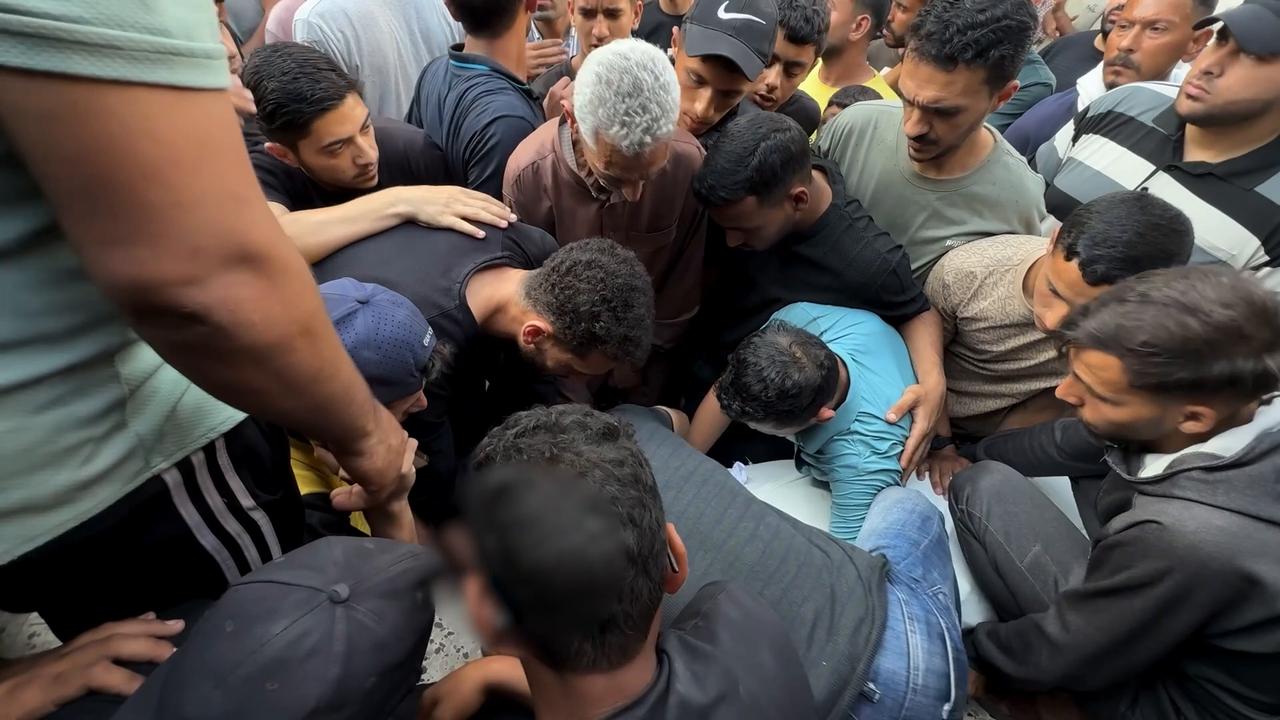 Video thumbnail for Funerals held for six Palestinians killed in Gaza city camp strike.