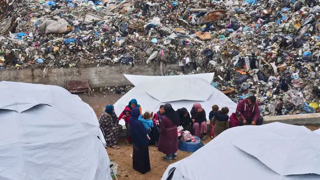'Video thumbnail for Displaced Palestinian families forced to seek refuge in Gaza landfill'