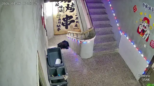 Video thumbnail for Woman Slips Carrying Food on Stairs in China
