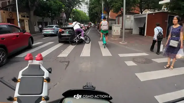 Video thumbnail for Cyclist Crashes Into Car at Bustling Tianjin Intersection