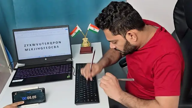 Video thumbnail for Fastest time to type the alphabet backwards using cutlery (both hands) - 5.41 second by Elavarasan S