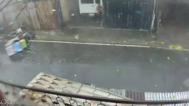 Video thumbnail for Strong winds flip tricycle amid rainstorm in Mandaluyong, Philippines