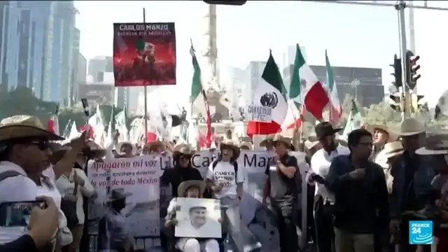 'Video thumbnail for Anti-crime protests in Mexico City injure 120 people, most of them police'