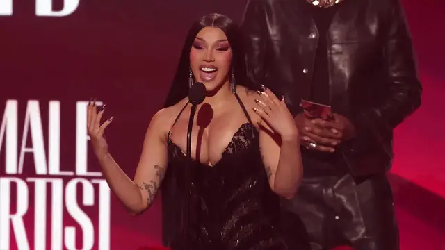 Video thumbnail for UNCAPTIONED: Cardi B reflects on overcoming 'fear and anxiety' to release album during BET Awards speech.
