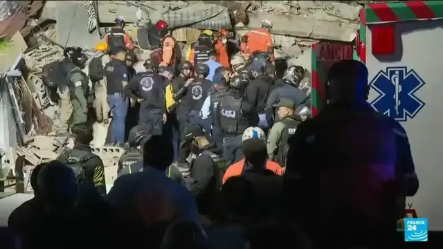 Video thumbnail for Venezuelans search rubble for quake survivors with thousands feared dead