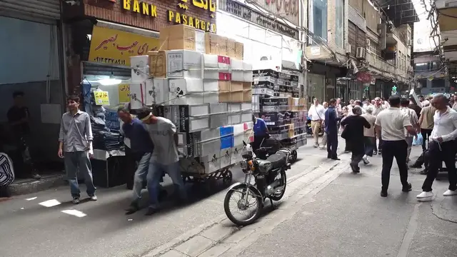 Video thumbnail for Iran: Daily life carries on in Tehran amid continuing Iran-US tensions.
