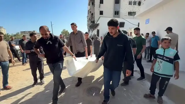 Video thumbnail for Funeral held for 9 Palestinians killed in Israeli strikes on Gaza City.