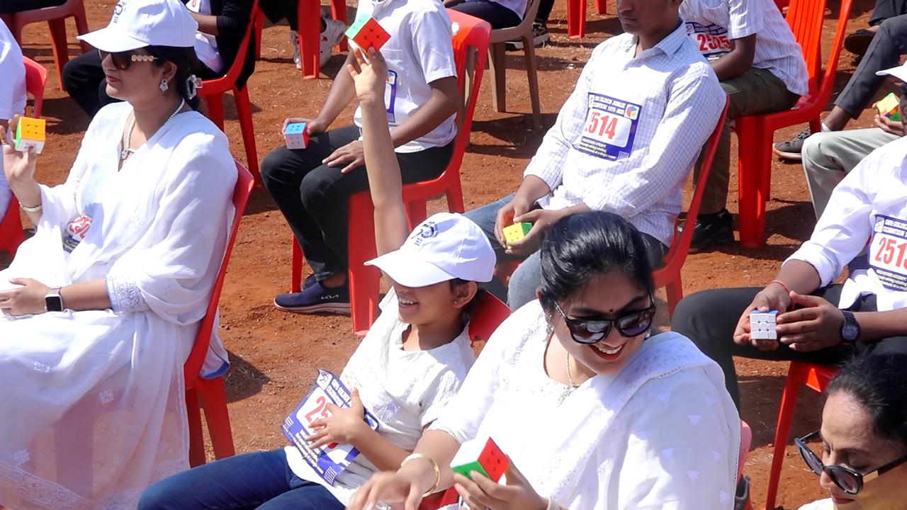 Video thumbnail for Most people solving rotating puzzle cubes simultaneously  5,434 by the Guru Nanak Public School