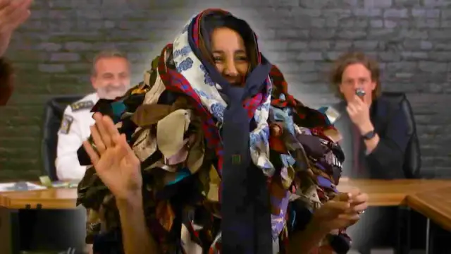 'Video thumbnail for Canadian wears so many neck ties she is unrecognisable!'