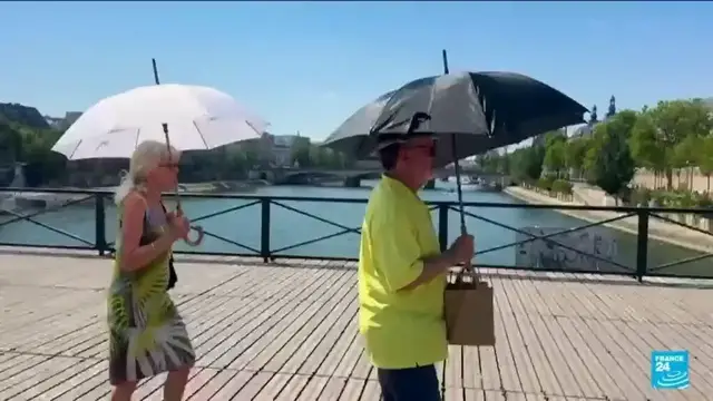 Video thumbnail for 'Brutal': Paris tourists struggle in extreme heat as sites close early