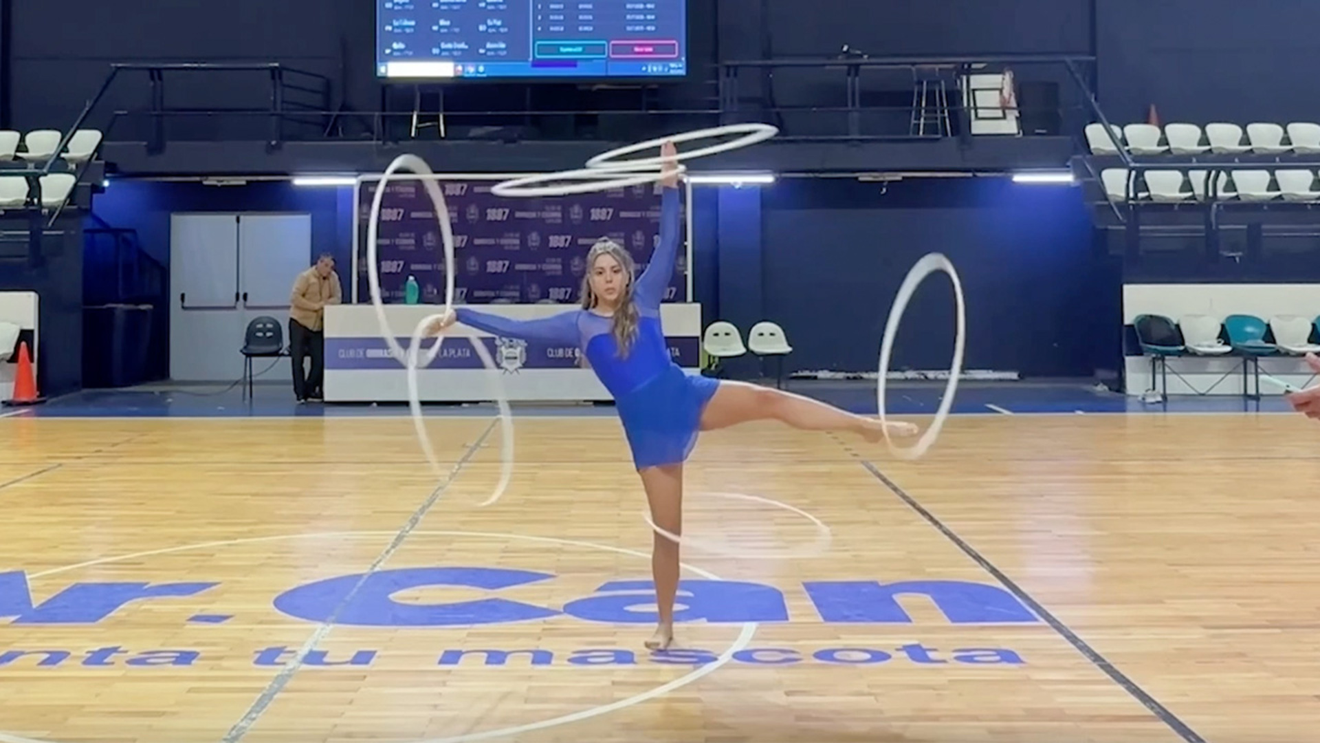 Video thumbnail for Longest duration performing a six hula hoop box split  1 minute 33 seconds by Sofia Lecuna