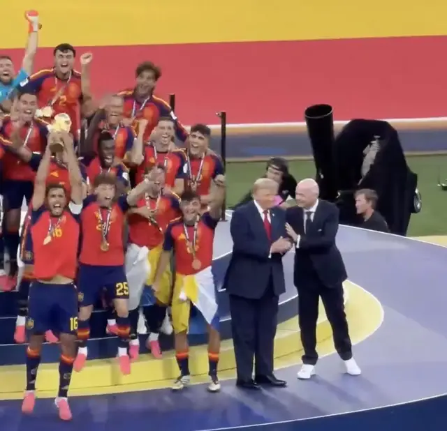 Video thumbnail for Infantino tries to usher Trump away as Spain lift World Cup