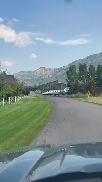 Video thumbnail for Private Jet Taxiing across a Quiet Neighborhood Road