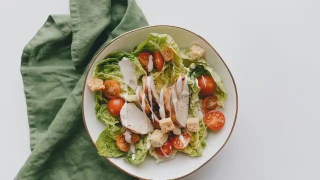 Video thumbnail for Healthy Kale Caesar Salad_ A Nutritious Twist on a Classic