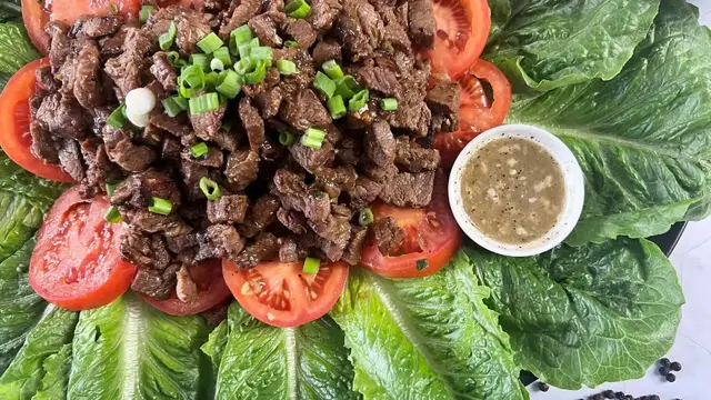 'Video thumbnail for Lok Lak (Cambodian Pepper Beef) Lettuce Wraps Recipe'