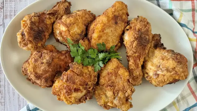 'Video thumbnail for Our Simple Classic Fried Chicken Recipe Uses A Rich Ingredient For Extra Crispiness'