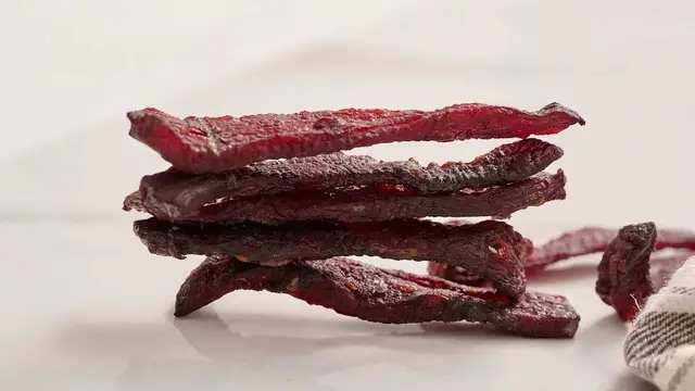 'Video thumbnail for Make Your Own Beef Jerky At Home With Our Sweet And Spicy Recipe'