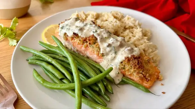 'Video thumbnail for Parmesan-Crusted Salmon With Creamy Herb Sauce Recipe'