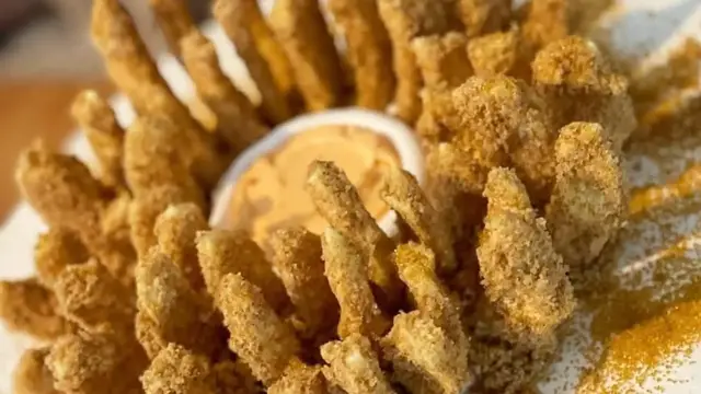 Video thumbnail for Here's What Really Makes Outback's Bloomin' Onion So Delicious