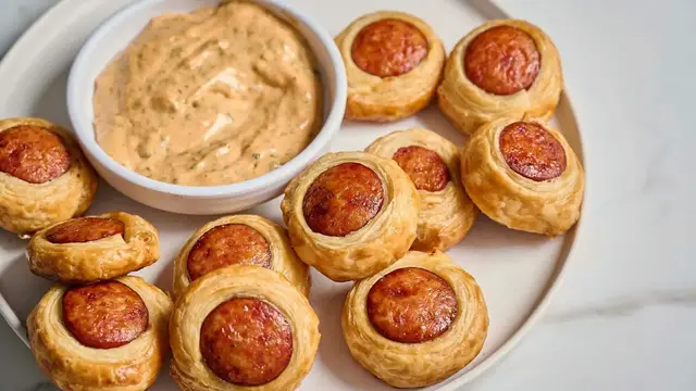 Video thumbnail for These Andouille Sausage Puffs Are The Ultimate Party Appetizer