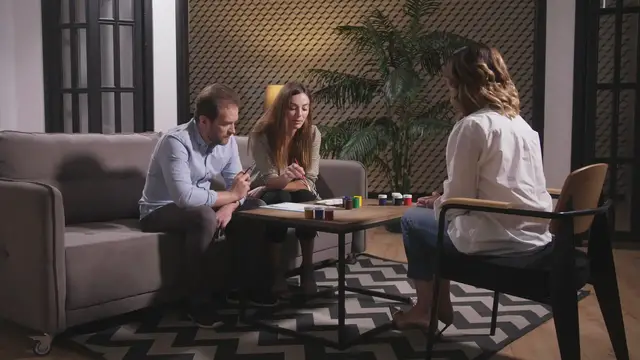 Video thumbnail for couple-talking-to-counselor-looking-at-drawing-SBV-337629480-HD test