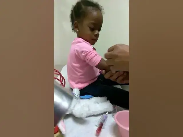 Video thumbnail for Rontryelle is a big girl getting her shot from Doctor.