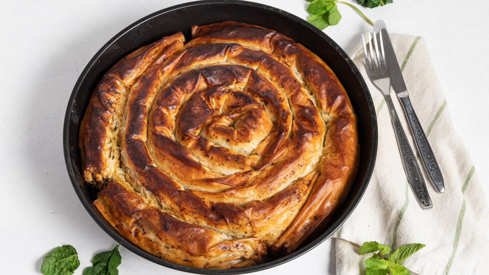 Video thumbnail for Greek Spiral Spanakopita Recipe