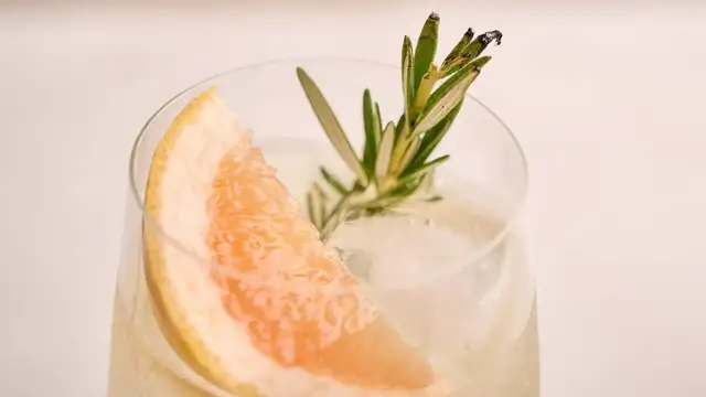 'Video thumbnail for Grapefruit And Rosemary White Wine Spritzer Recipe'