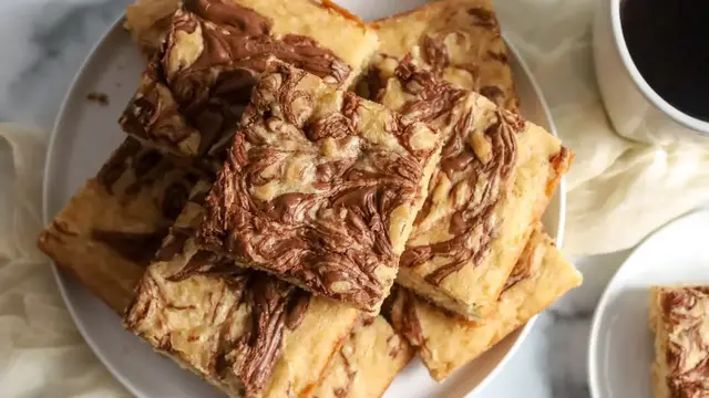 'Video thumbnail for These Banana Nutella Bars Are Made For Sharing'