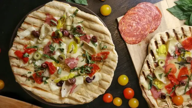 'Video thumbnail for This Grilled Pizza Recipe Packs All Your Favorite Antipasto Bites'