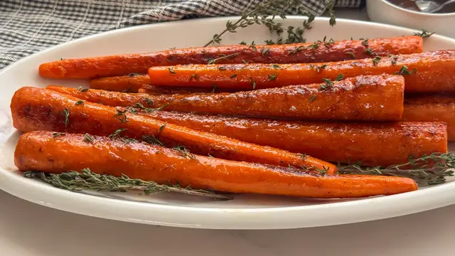 Video thumbnail for Bourbon-Glazed Grilled Carrots Recipe