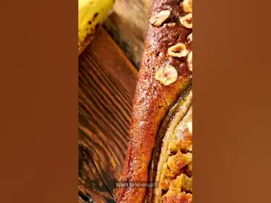 'Video thumbnail for 🍌 Irresistible Banana Bread Bliss: A Slice of Heaven! 🍞✨'